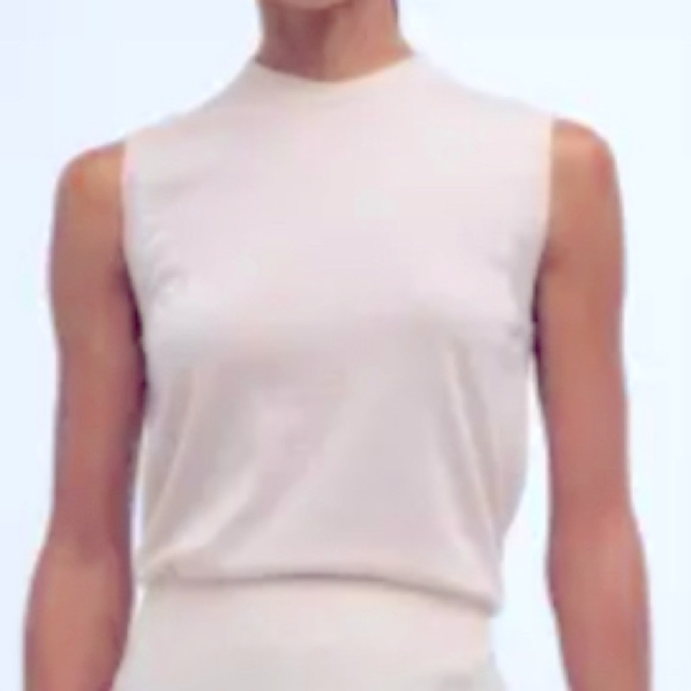 NEW - L - comfy, chic, and streamlined - this sleeveless sweater is a favorite.